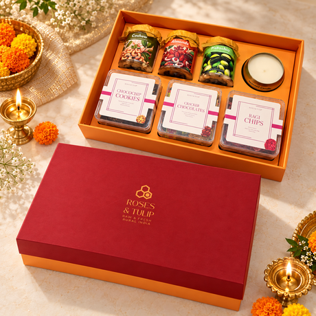 Closed red gift box displayed beside an open box showing the hamper contents